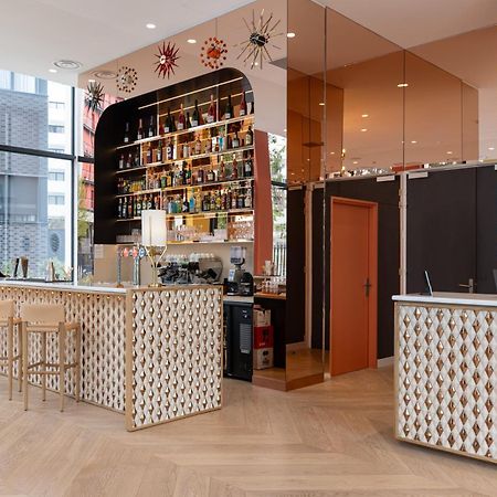 Hotel Kyriad Prestige Paris Asnieres Bagian luar foto