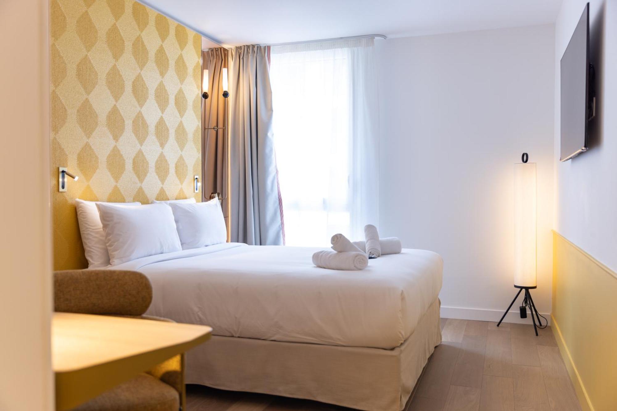 Hotel Kyriad Prestige Paris Asnieres Bagian luar foto