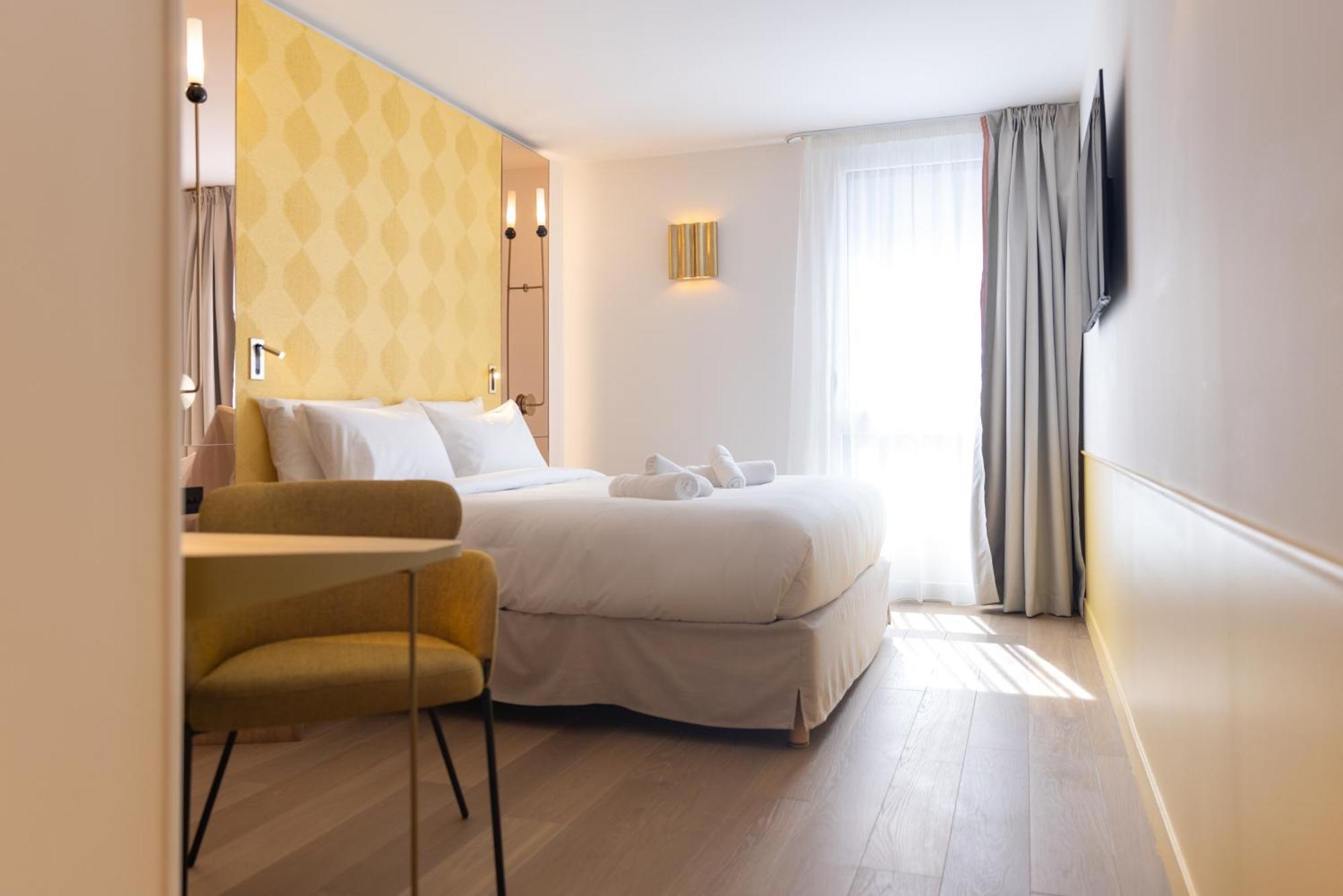 Hotel Kyriad Prestige Paris Asnieres Bagian luar foto